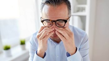 Businessman rubs his eyes appearing stressed e1657258802367 5 Best Stress Management Techniques