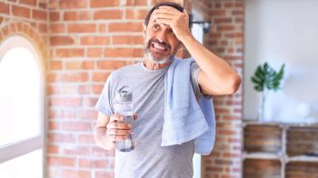 confused middle age man before training How to Overcome 5 Common Diet and Exercise Mistakes