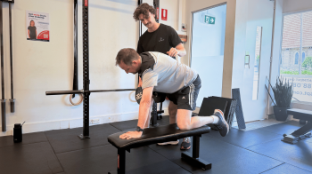 our trainer jeremy helping a client with gym motivation in his personal training sessions